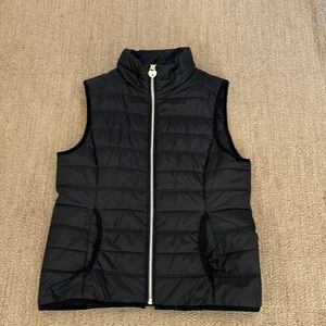 Black guess vest size small petite. light and warm like new condition